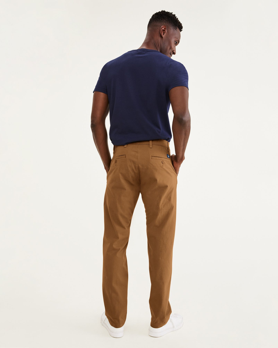 Back view of model wearing Dark Ginger Ultimate Chinos, Athletic Fit.