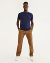 Front view of model wearing Dark Ginger Ultimate Chinos, Athletic Fit.