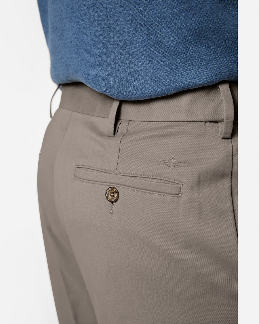 View of model wearing Dark Pebble Comfort Khakis, Pleated, Relaxed Fit.