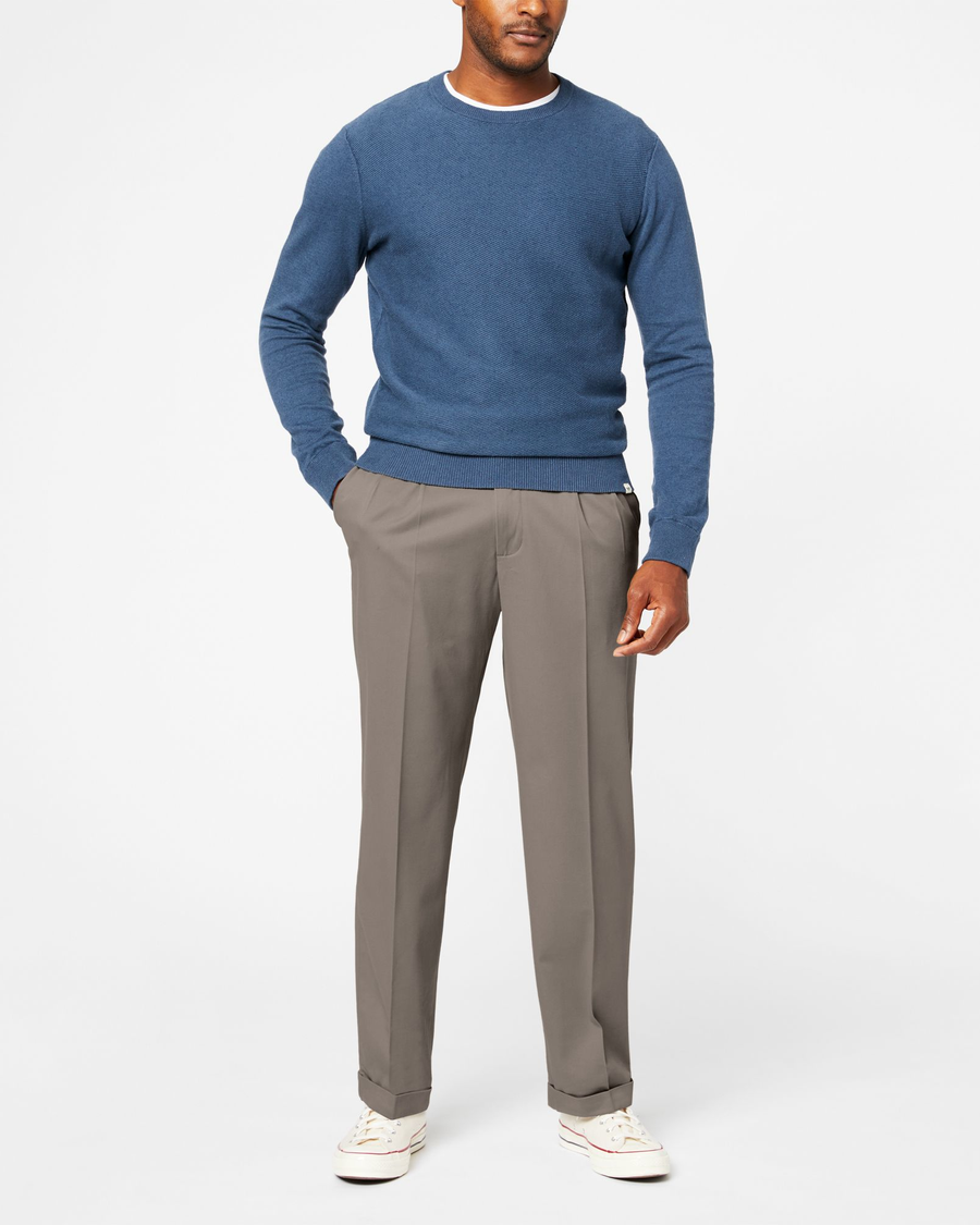 Front view of model wearing Dark Pebble Comfort Khakis, Pleated, Relaxed Fit.