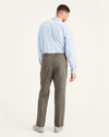 Back view of model wearing Dark Pebble Easy Khakis, Pleated, Classic Fit (Big and Tall).