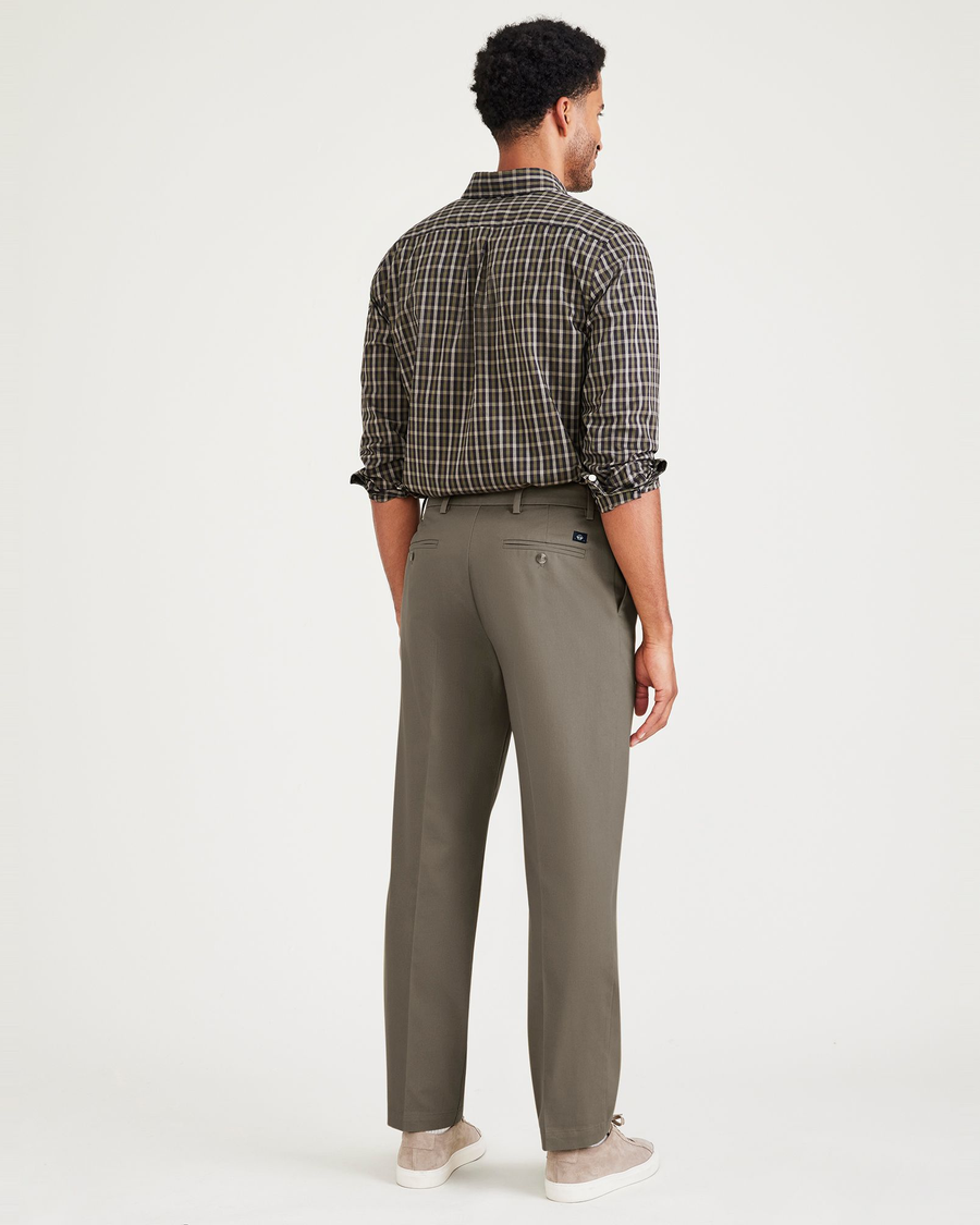 Back view of model wearing Dark Pebble Signature Iron Free Khakis, Pleated, Classic Fit with Stain Defender® (Big and Tall).
