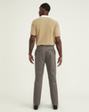 Back view of model wearing Dark Pebble Signature Iron Free Khakis, Straight Fit with Stain Defender® (Big and Tall).