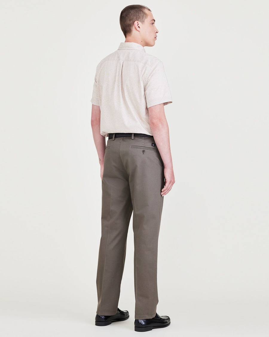 Back view of model wearing Dark Pebble Signature Iron Free Khakis, Straight Fit with Stain Defender®.