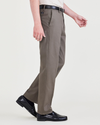 Side view of model wearing Dark Pebble Signature Iron Free Khakis, Straight Fit with Stain Defender®.