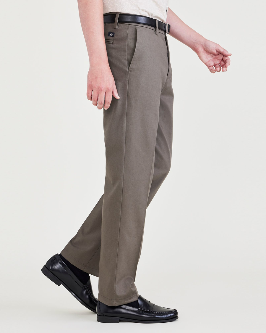 Side view of model wearing Dark Pebble Signature Iron Free Khakis, Straight Fit with Stain Defender®.