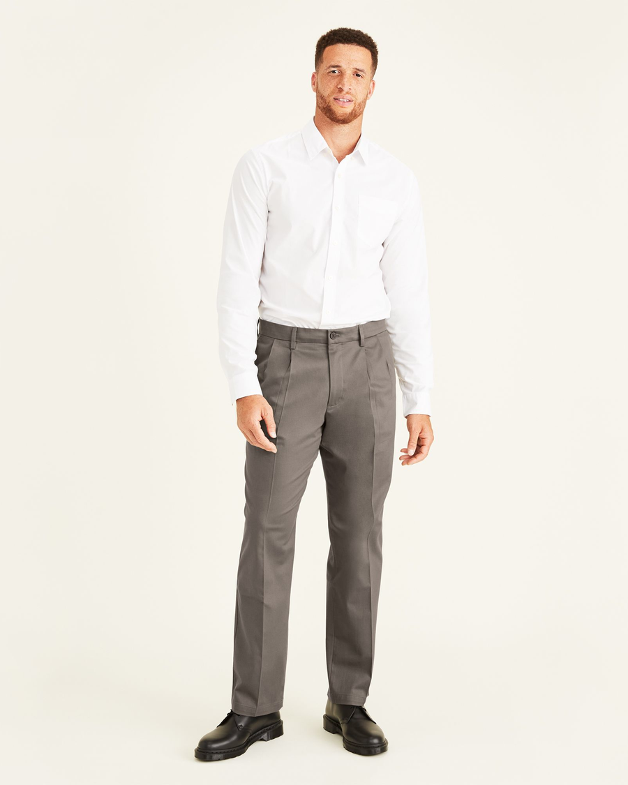 Front view of model wearing Dark Pebble Signature Khakis, Pleated ...