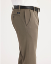 Side view of model wearing Dark Pebble Workday Khakis, Slim Fit.