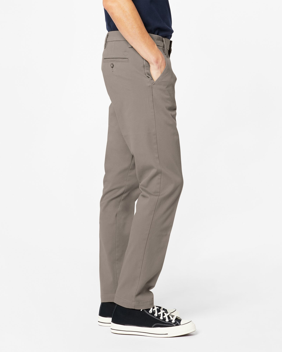 Side view of model wearing Dark Pebble Workday Khakis, Slim Fit.