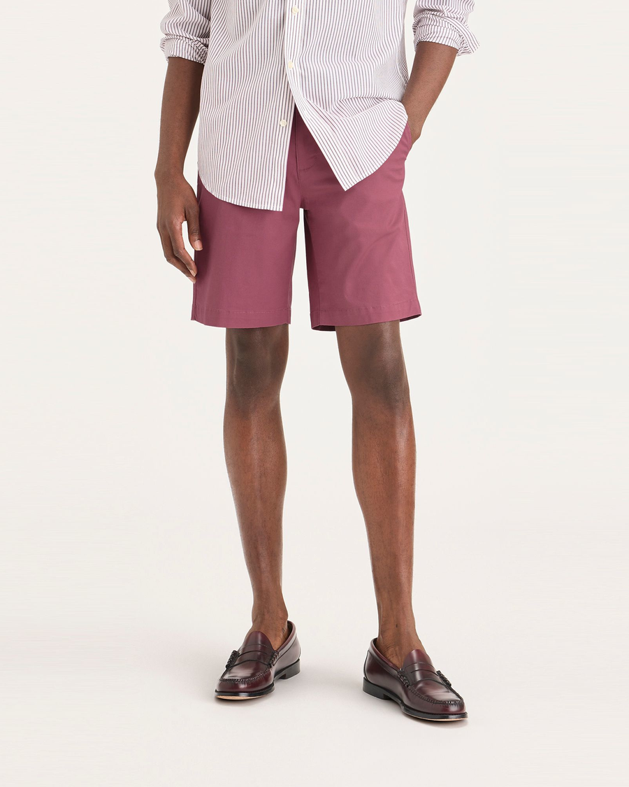 Front view of model wearing Dry Rose Ultimate 9.5" Shorts.