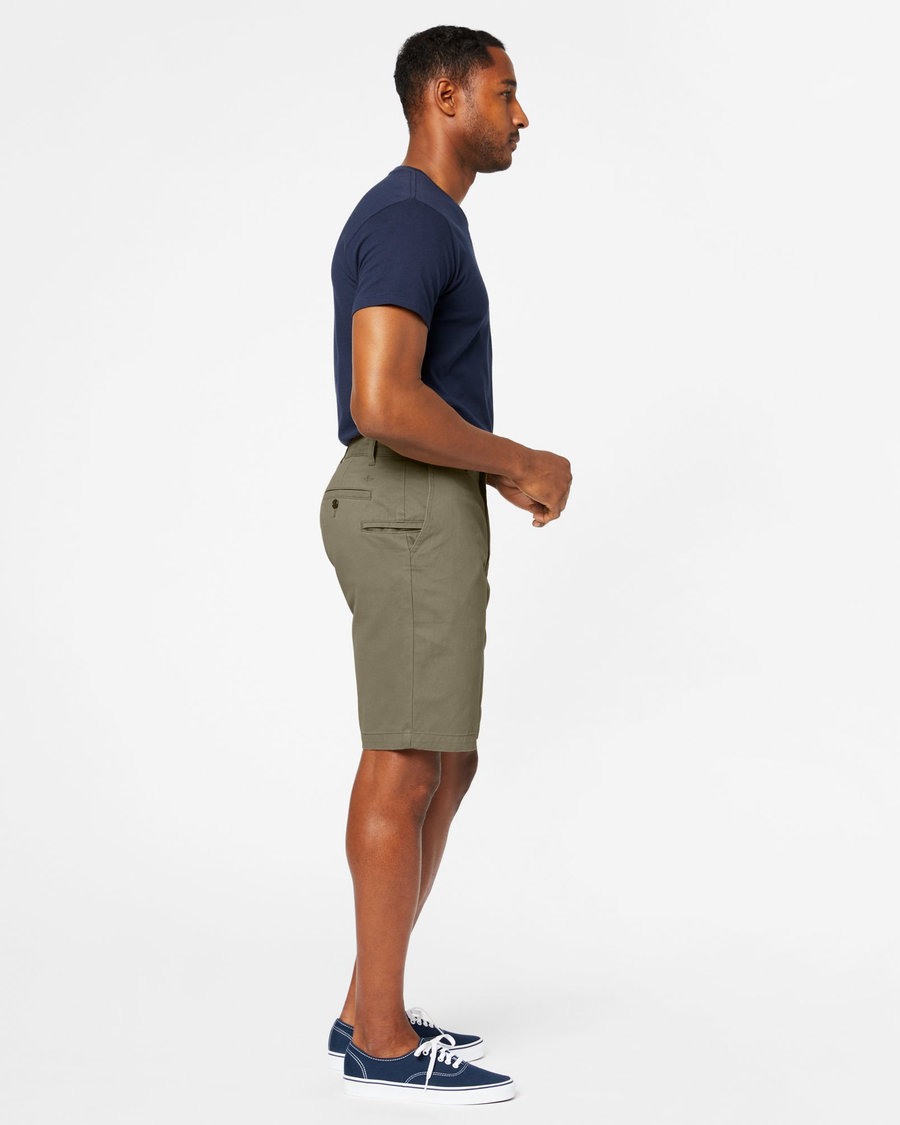 Side view of model wearing Earth Moss Perfect 10.5" Shorts.