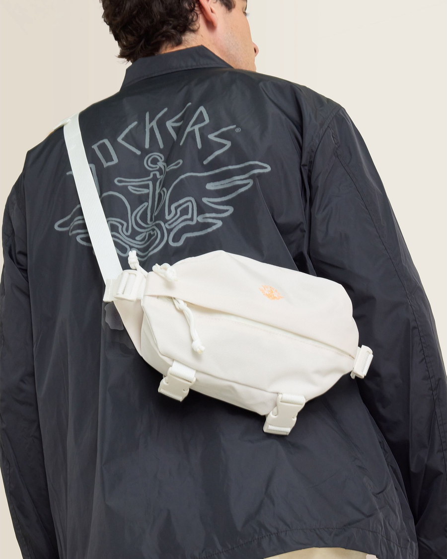 Back view of model wearing Egret Dandois x Dockers® Bag.