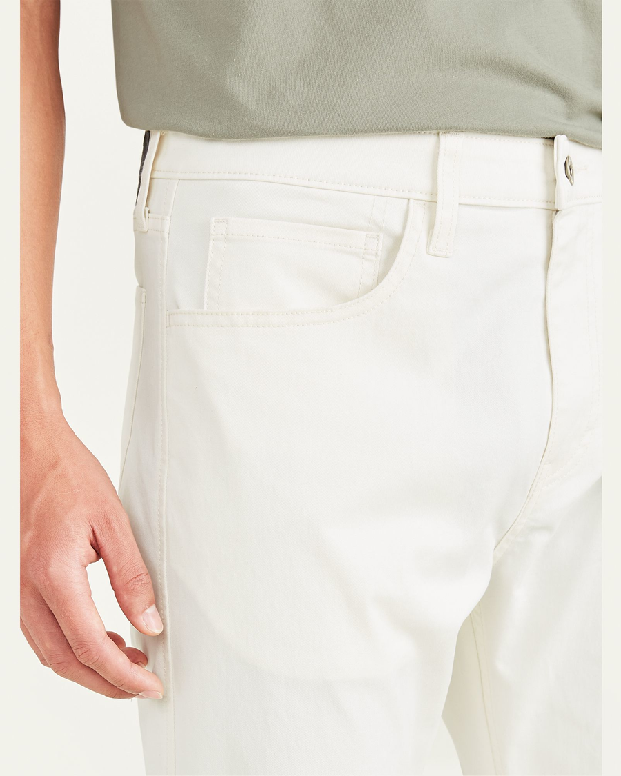 View of model wearing Egret Jean Cut Pants, Slim Fit.