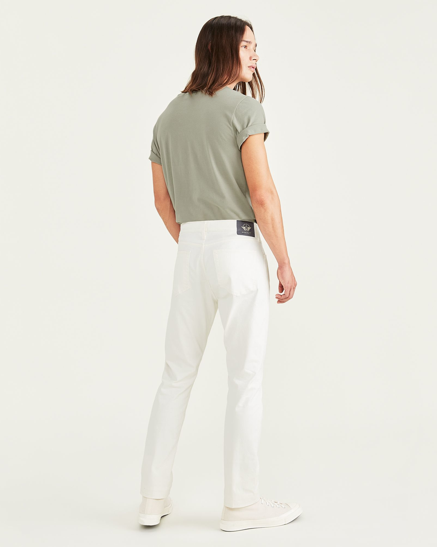 Back view of model wearing Egret Jean Cut Pants, Slim Fit.