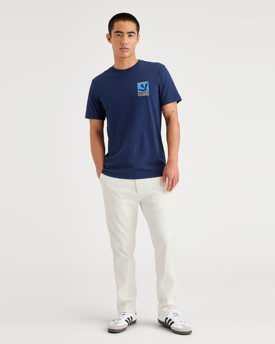 Front view of model wearing Egret Original Chinos, Slim Fit.