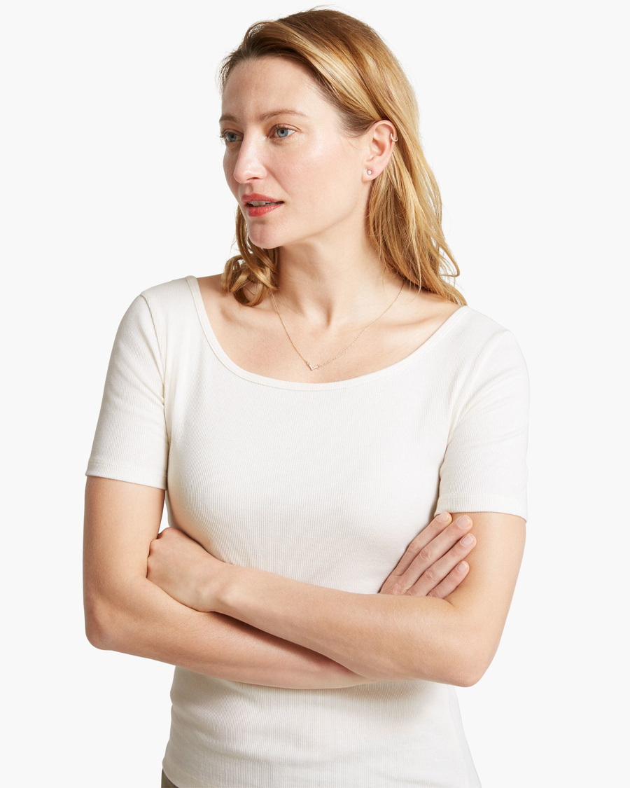 View of model wearing Egret Scoop Neck Tee Shirt.