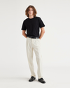 Front view of model wearing Egret Signature Iron Free Khakis, Pleated, Classic Fit with Stain Defender®.