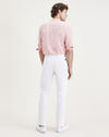 Back view of model wearing Egret Ultimate Chinos, Slim Fit.