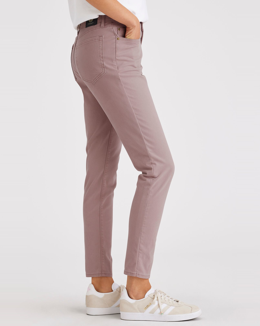 Side view of model wearing Fawn Jean Cut Pants, High Slim Fit.