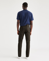Back view of model wearing Fern City Tech Trousers, Slim Fit.