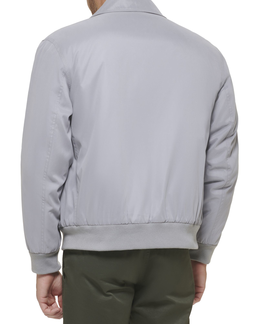 Back view of model wearing Foil Microtwill Relaxed Laydown Collar Bomber.