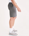 Side view of model wearing Foil Ultimate 9.5" Shorts (Big and Tall).