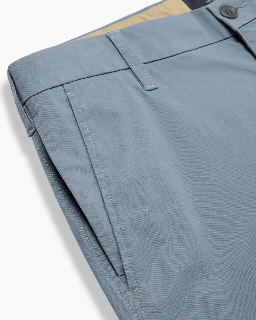 View of model wearing Folkstone Grey Ultimate 9.5" Shorts.