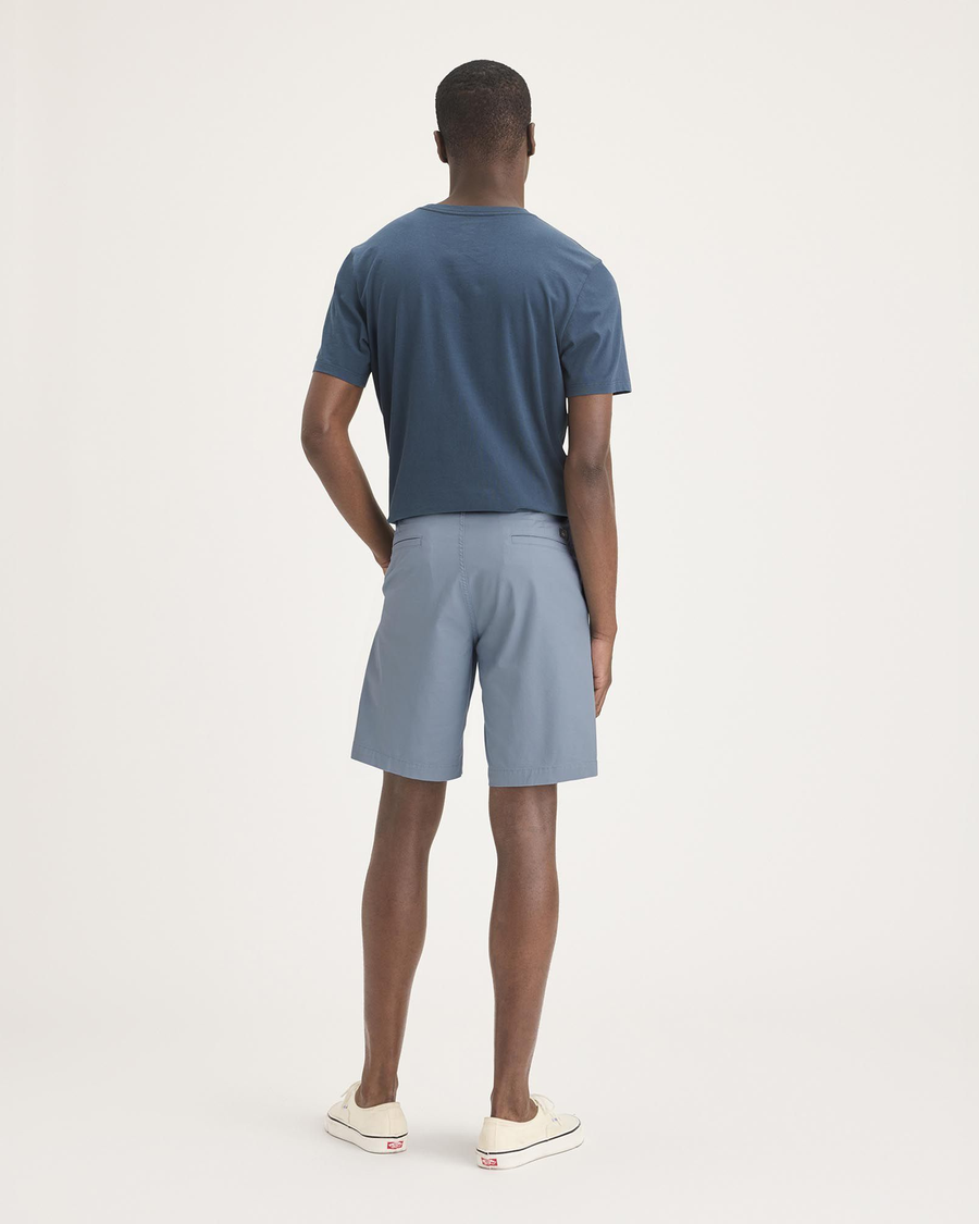 Back view of model wearing Folkstone Grey Ultimate 9.5" Shorts.