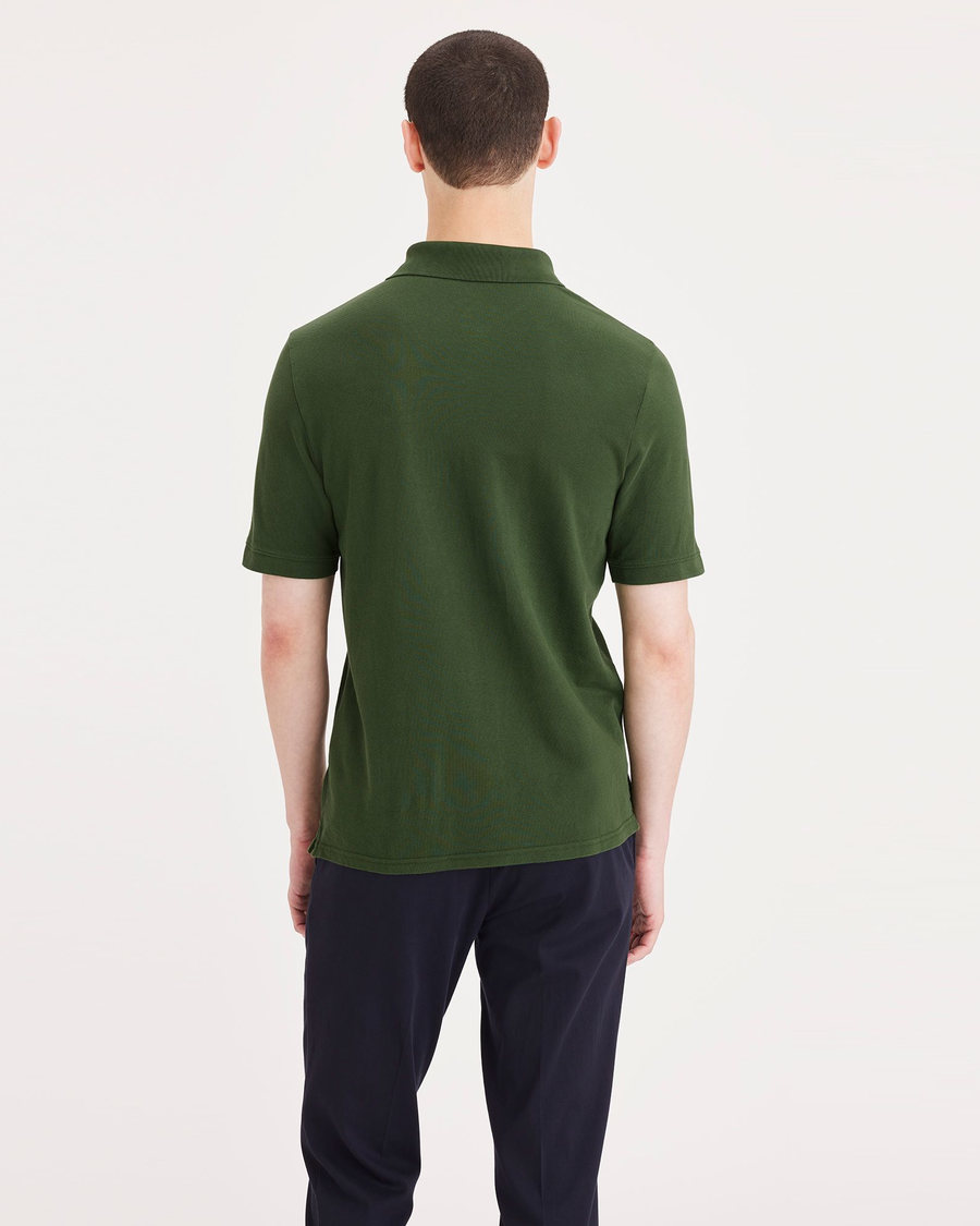 Back view of model wearing Forest Elf Rib Collar Polo, Slim Fit.