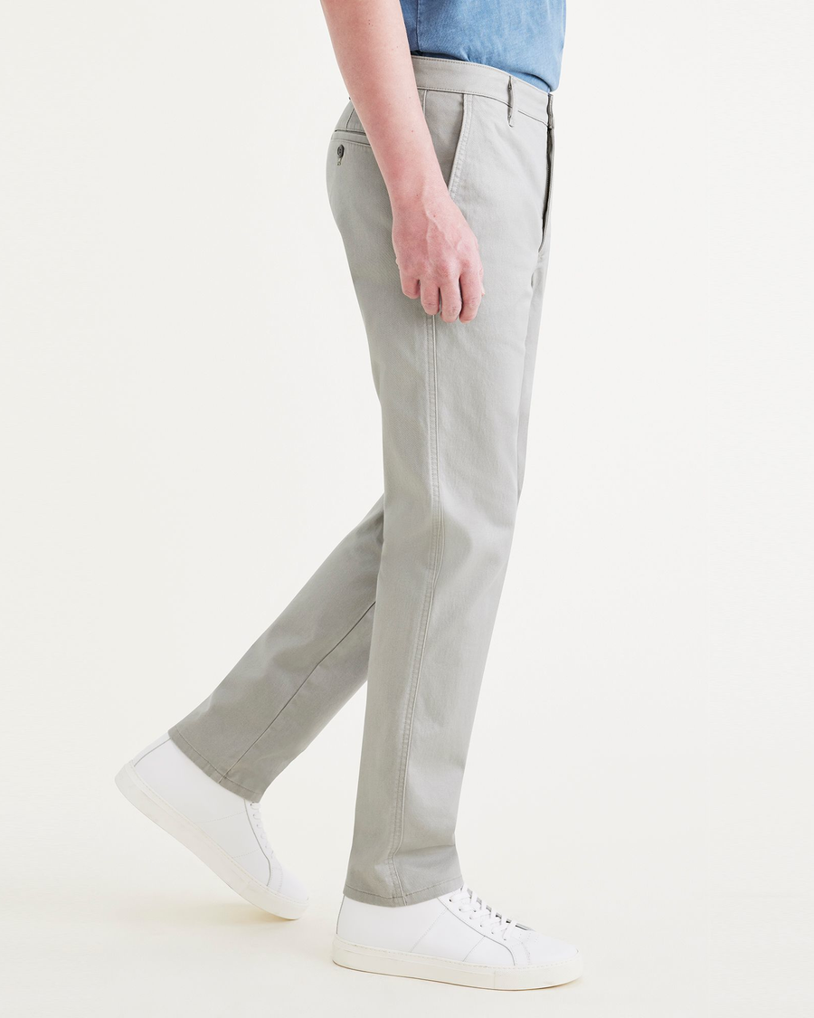 Side view of model wearing Forest Fog Original Chinos, Slim Fit.