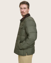 Side view of model wearing Forest Green Midweight Box Quilted Jacket.