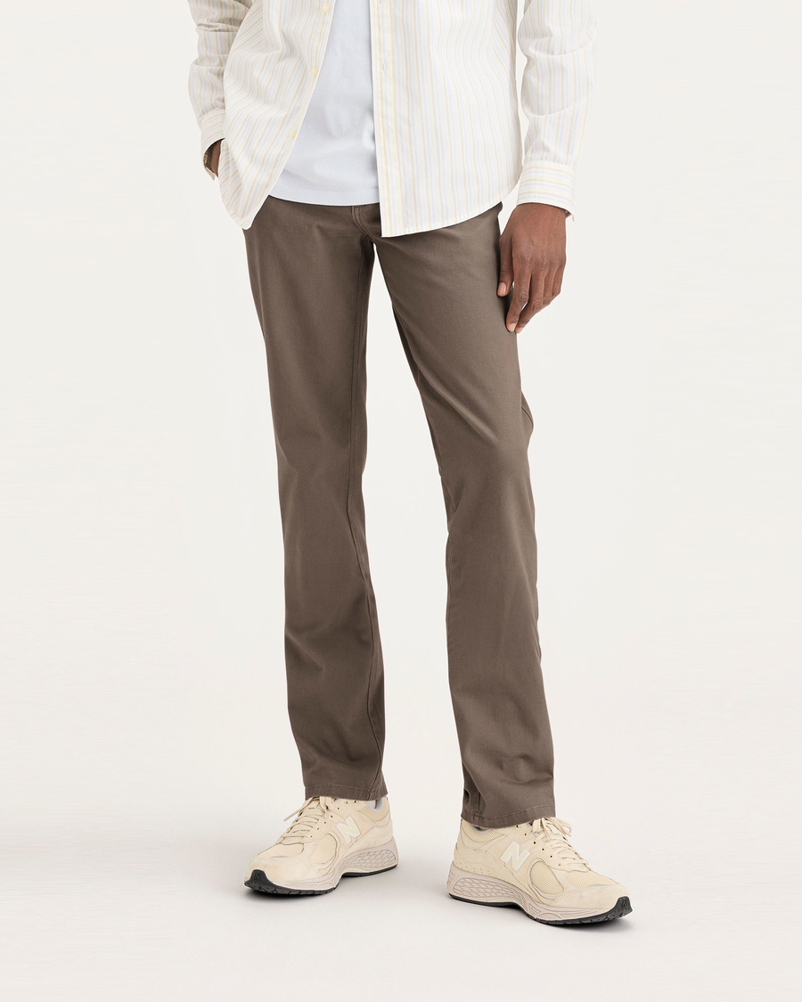 Front view of model wearing Fossil Ultimate Chinos, Slim Fit.