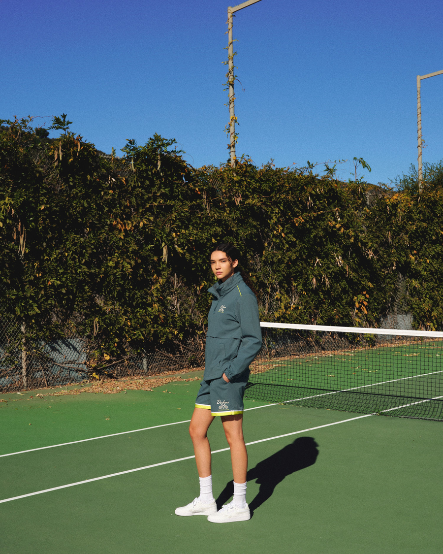 View of model wearing Green Heron Racquet Club Retro 5.5" Short, Relaxed Fit.