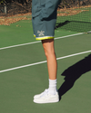 View of model wearing Green Heron Racquet Club Retro 5.5" Short, Relaxed Fit.