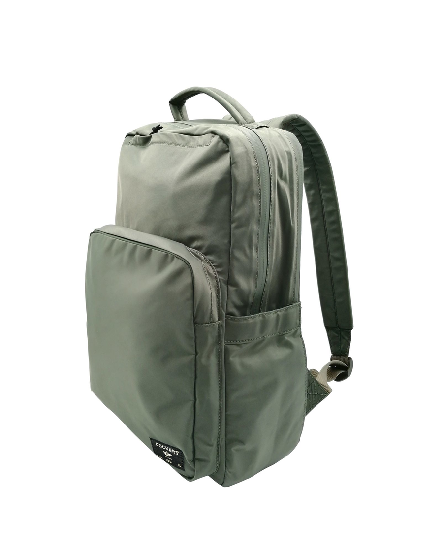 View of model wearing Green Standard Backpack, 20 L.
