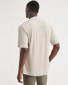 Back view of model wearing Grit Knit Button Up, Regular Fit.