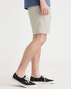 Side view of model wearing Grit Playa 7.5" Shorts.