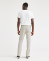 Back view of model wearing Grit Ultimate Chinos, Slim Fit.