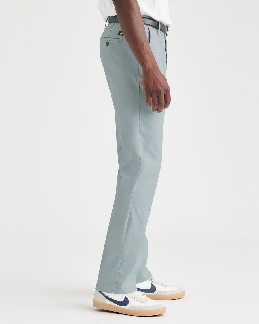 Side view of model wearing Harbor Grey Workday Khakis, Slim Fit.