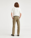 Back view of model wearing Harvest Gold Alpha Chino, Straight Fit.