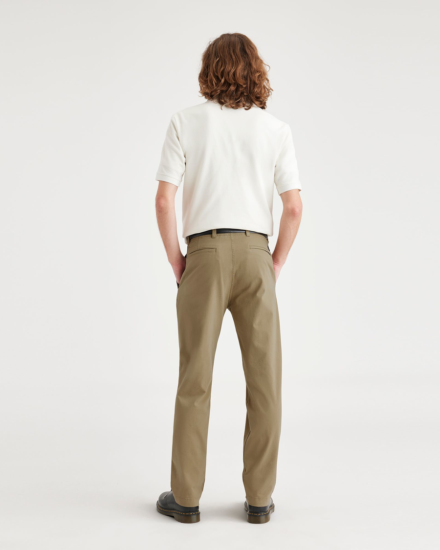 Back view of model wearing Harvest Gold Alpha Chino, Straight Fit.