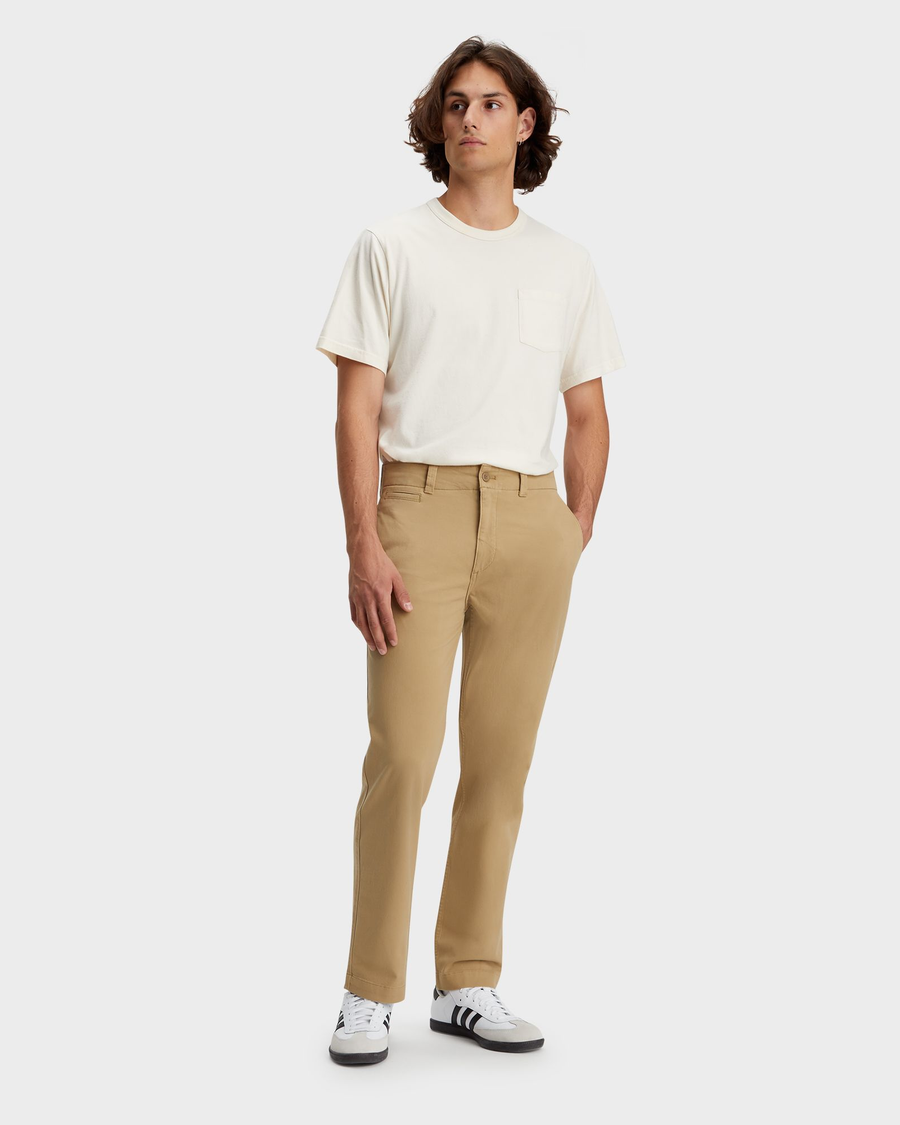 Front view of model wearing Harvest Gold Alpha Chino, Straight Fit.