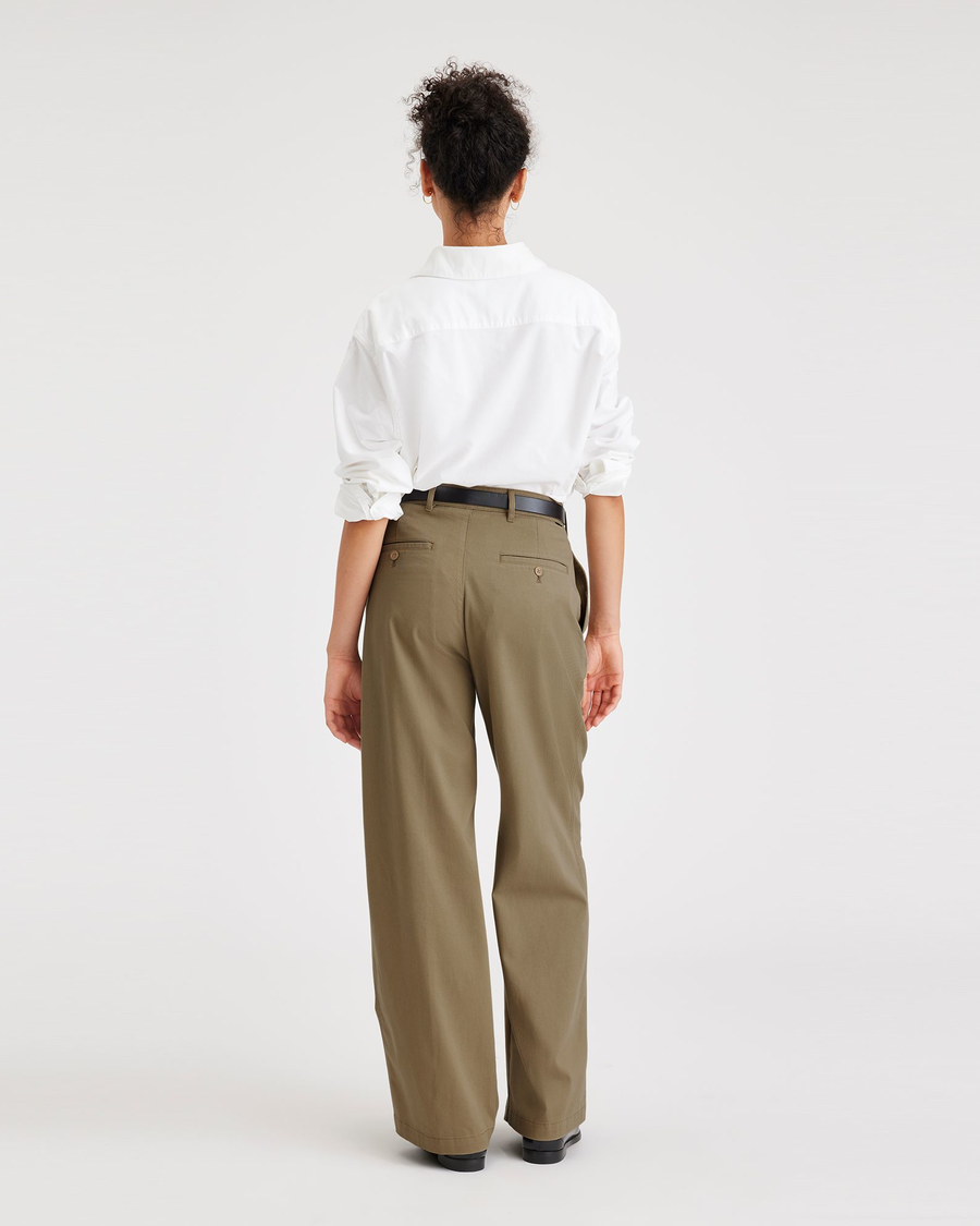 Back view of model wearing Harvest Gold Beale Pleated Chino, High Wide Fit.