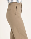 Side view of model wearing Harvest Gold Blake Chino, High Straight Fit.