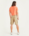 Back view of model wearing Harvest Gold Cargo 9" Shorts, Straight Fit.