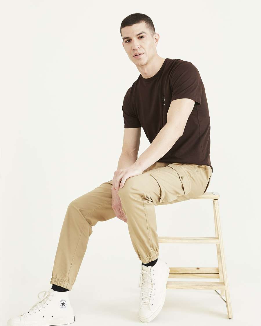View of model wearing Harvest Gold Cargo Joggers, Straight Tapered Fit.
