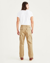 Back view of model wearing Harvest Gold Cargo Pants, Relaxed Fit.