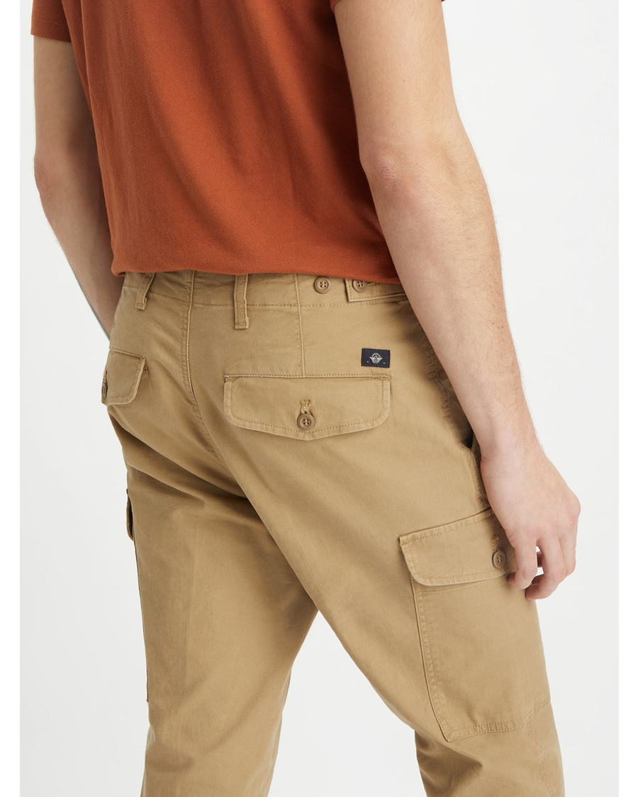 View of model wearing Harvest Gold Cargo Pants, Slim Tapered Fit.