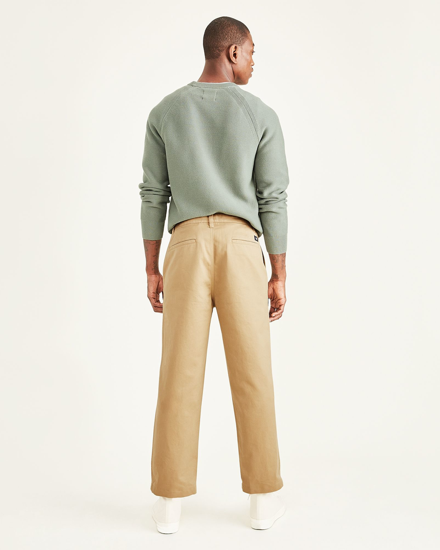 Back view of model wearing Harvest Gold Cropped Khakis, Straight Fit.