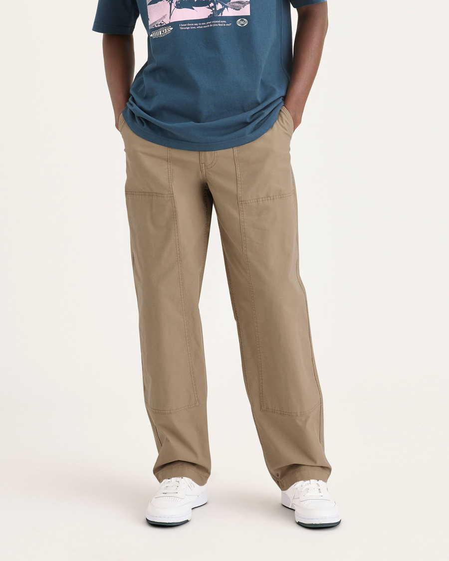 Front view of model wearing Harvest Gold Eighty-Six Utility Pants, Loose Fit.